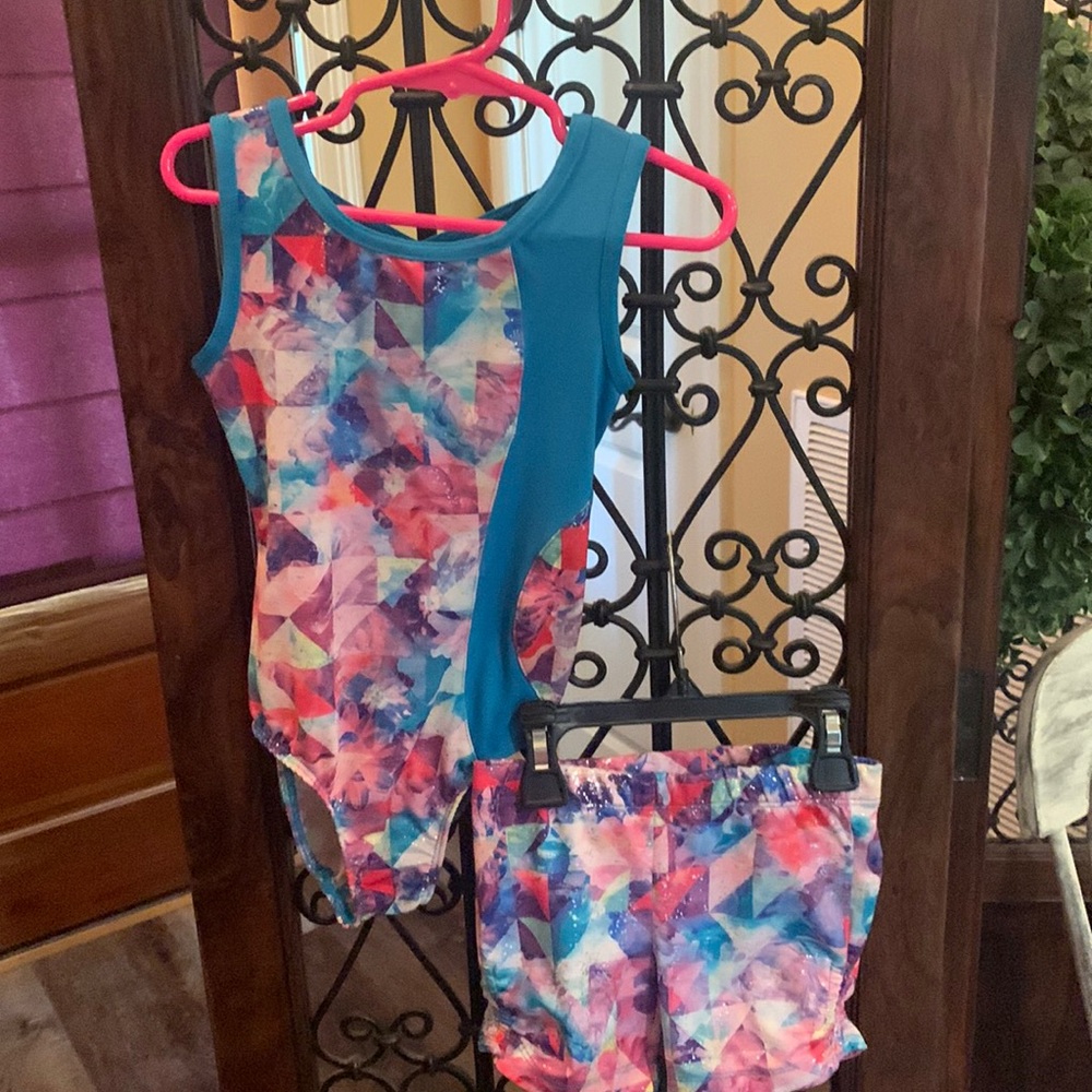 EUC girls swimsuit with matching cover up shorts. Really cute.